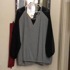Black and silver blouse with sheer sleeves